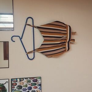 Stripped, cropped top with cute tie in the back.